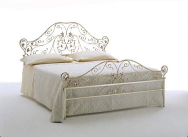 Letto in ferro battuto decorato con foglie e fiori